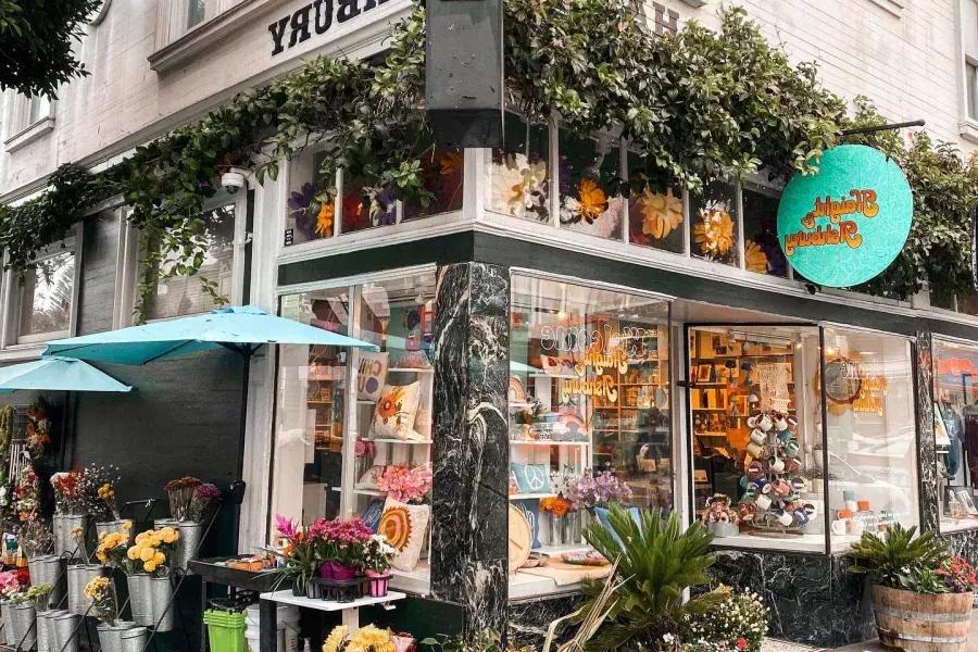 A corner storefront in Haight-Ashbury with items on display.